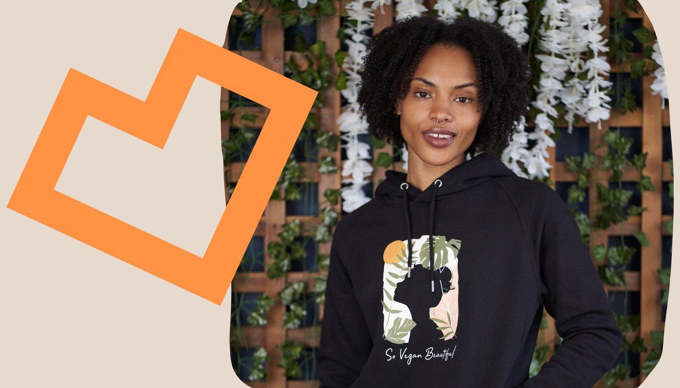 creator wearing a hoodie and spreadshop logo